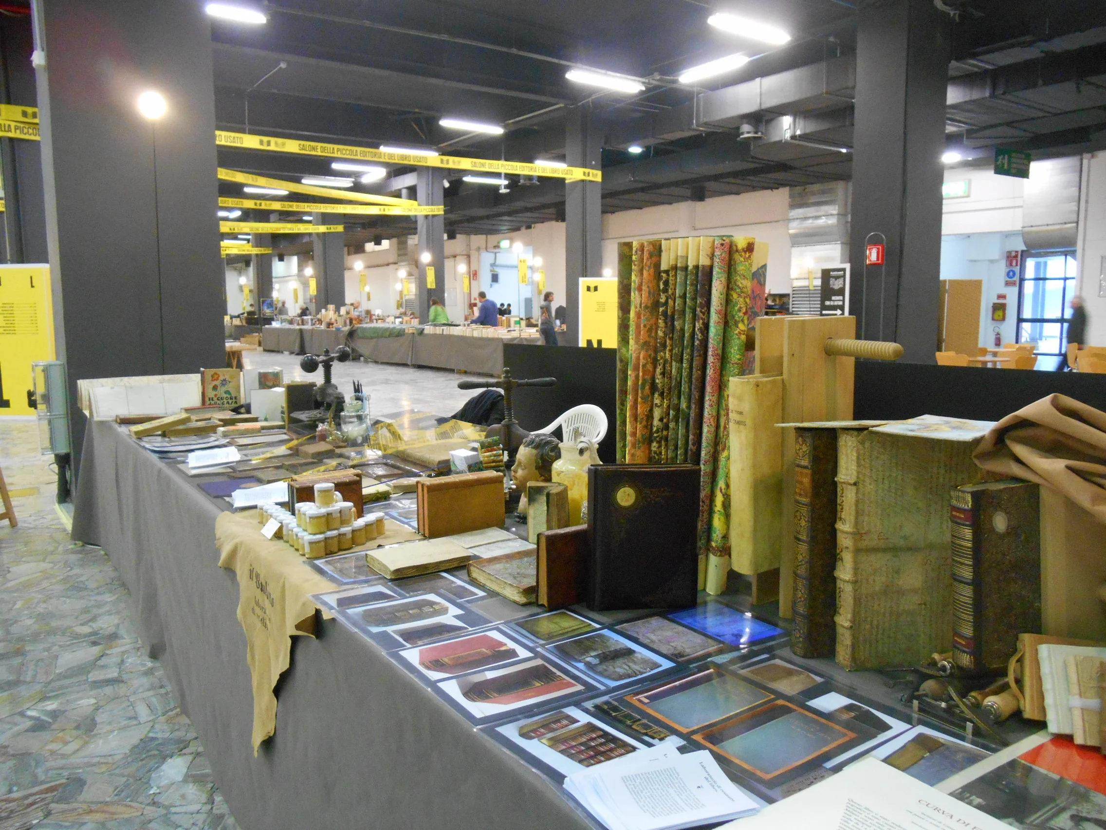  alcuni lavori di restauro esposti al Salone del Libro di Milano 