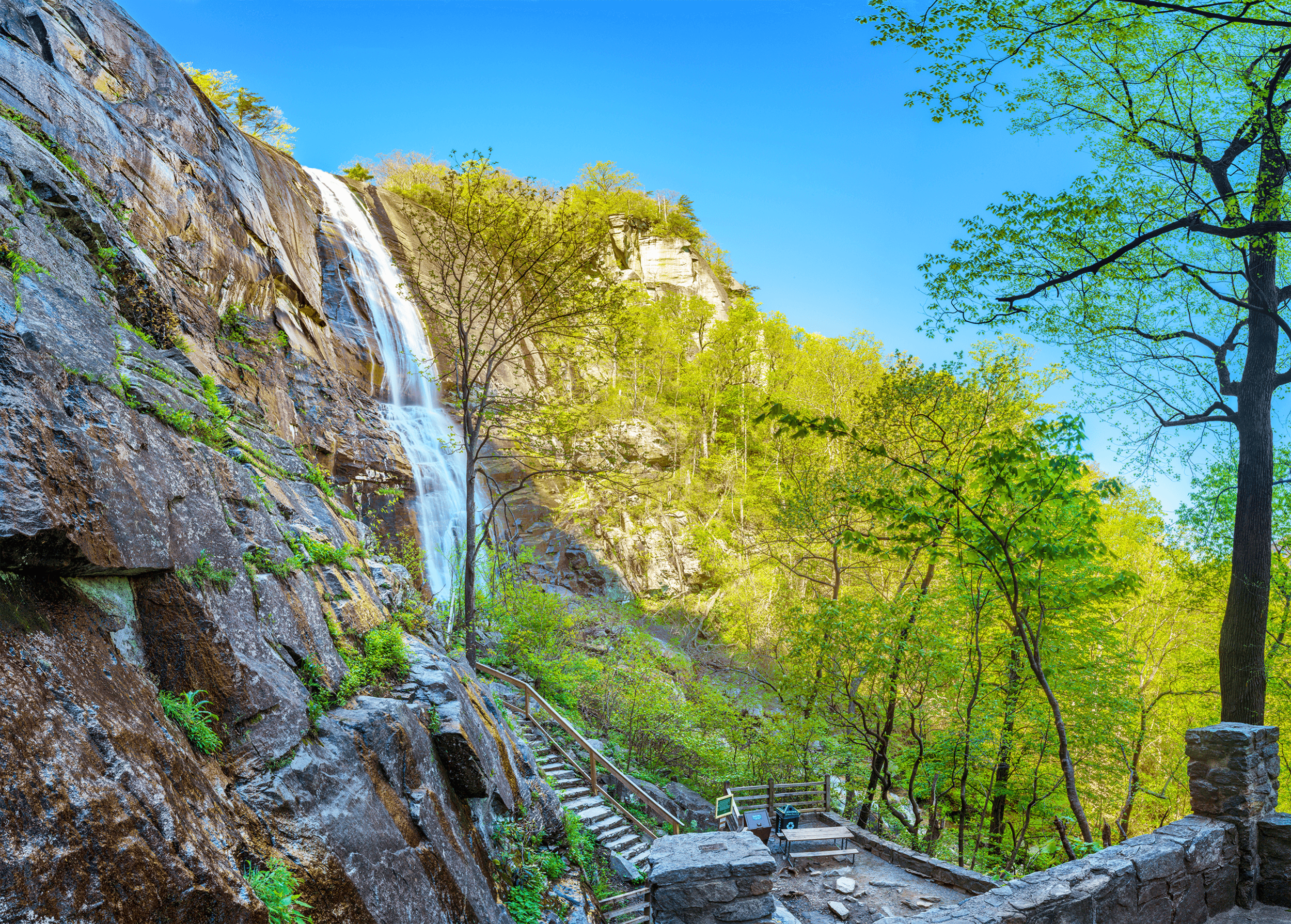 Especially after a couple of days of rain, the thundering Hickory Nut Falls is an impressive sight even from a distance. To get closer to the 404-foot (123 meters) waterfall, follow the path with the stone steps.