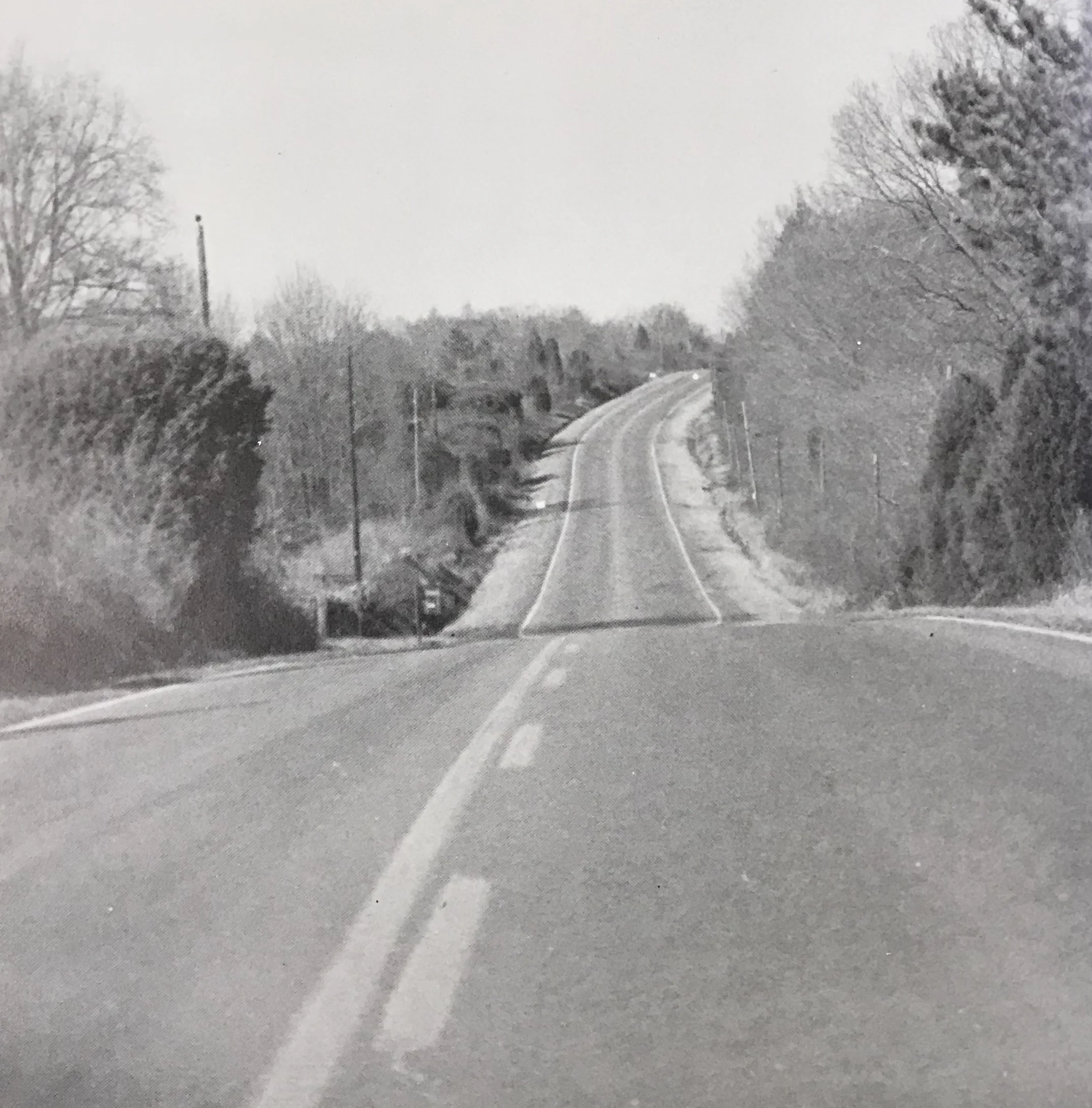 Two-lane Providence Road Heading to Charlotte Latin School
