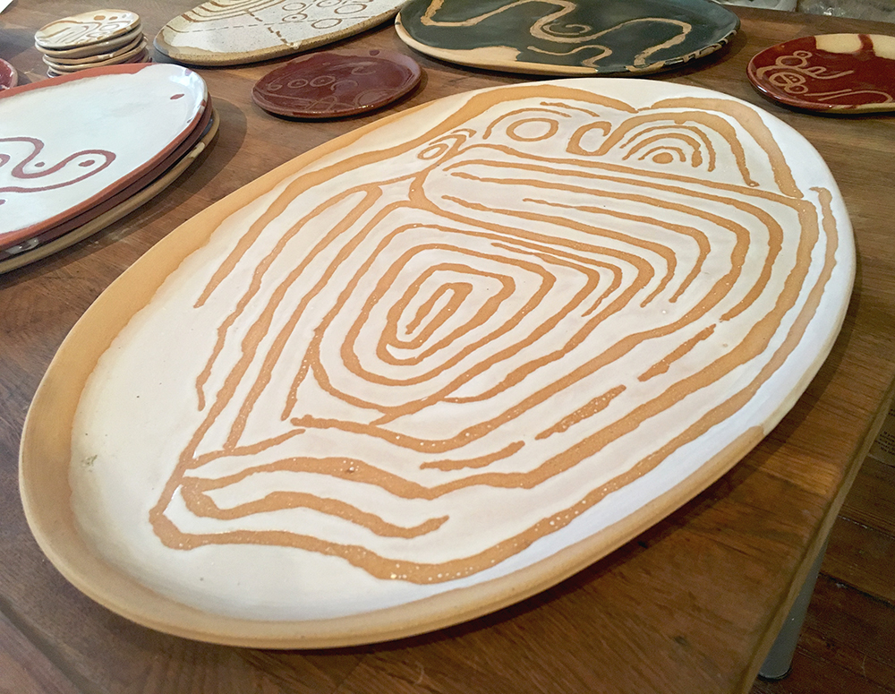  large platter: owl calendar neolithic petroglyph in white on blush clay 