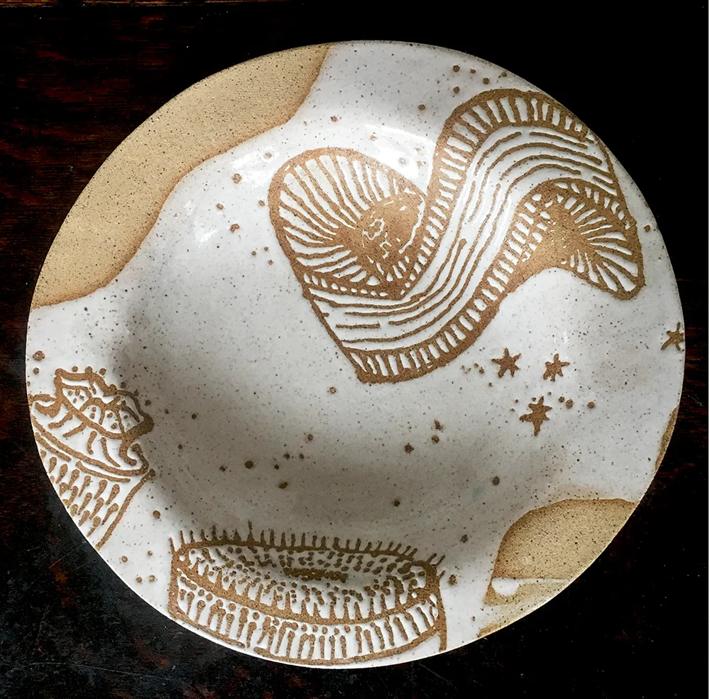 low bowl in white on speckled clay