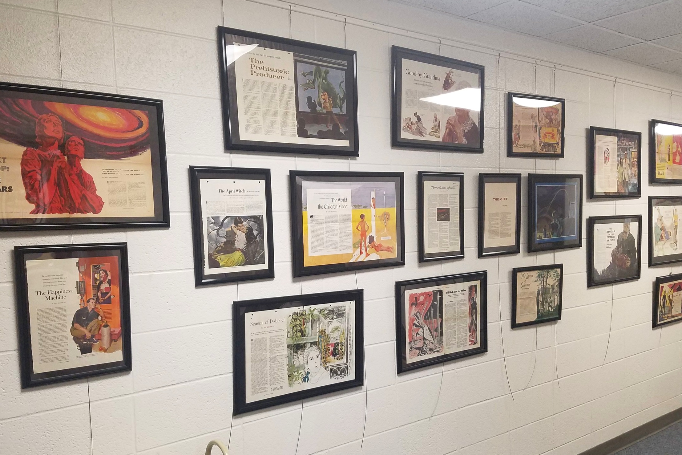 The hallway leading to the Center for Ray Bradbury Studies acts as further exhibit space. In the early months of 2018, fellow intern Emily Hanawalt and I created this expansive gallery wall of cut sheets from Ray Bradbury’s collection of publicatio