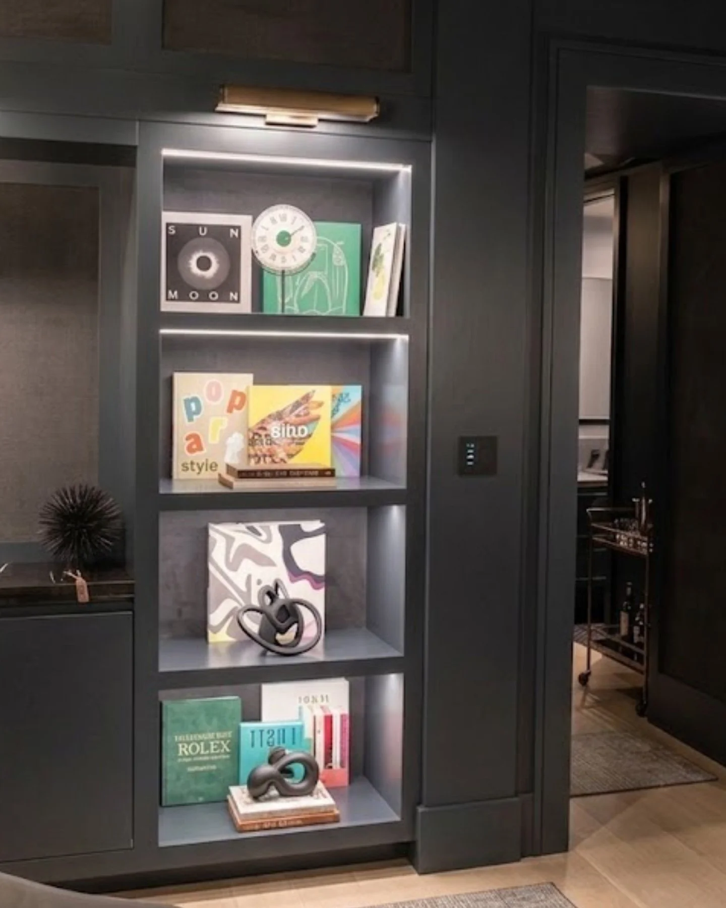 Good smart lighting doesn't just illuminate a room. It transforms it.

The right setup turns an ordinary shelf into a statement. Whether it's a moody ambiance or a clean, minimal scene, automated lighting makes every corner of your home feel intentio