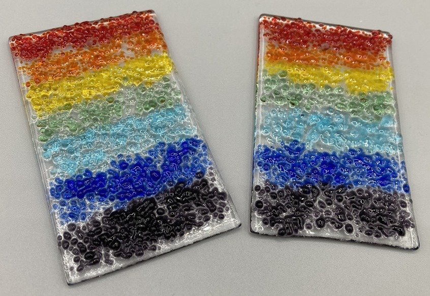 Two Frit Rainbow Plaques Fused Glass.jpg