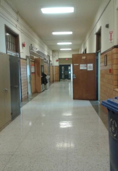  This is a picture of the math hallway on the 3rd floor of the UTS building. In the picture you can see the doors to the math classrooms and to the teachers office area. This picture relates to expectations at UTS because students are expected to lov