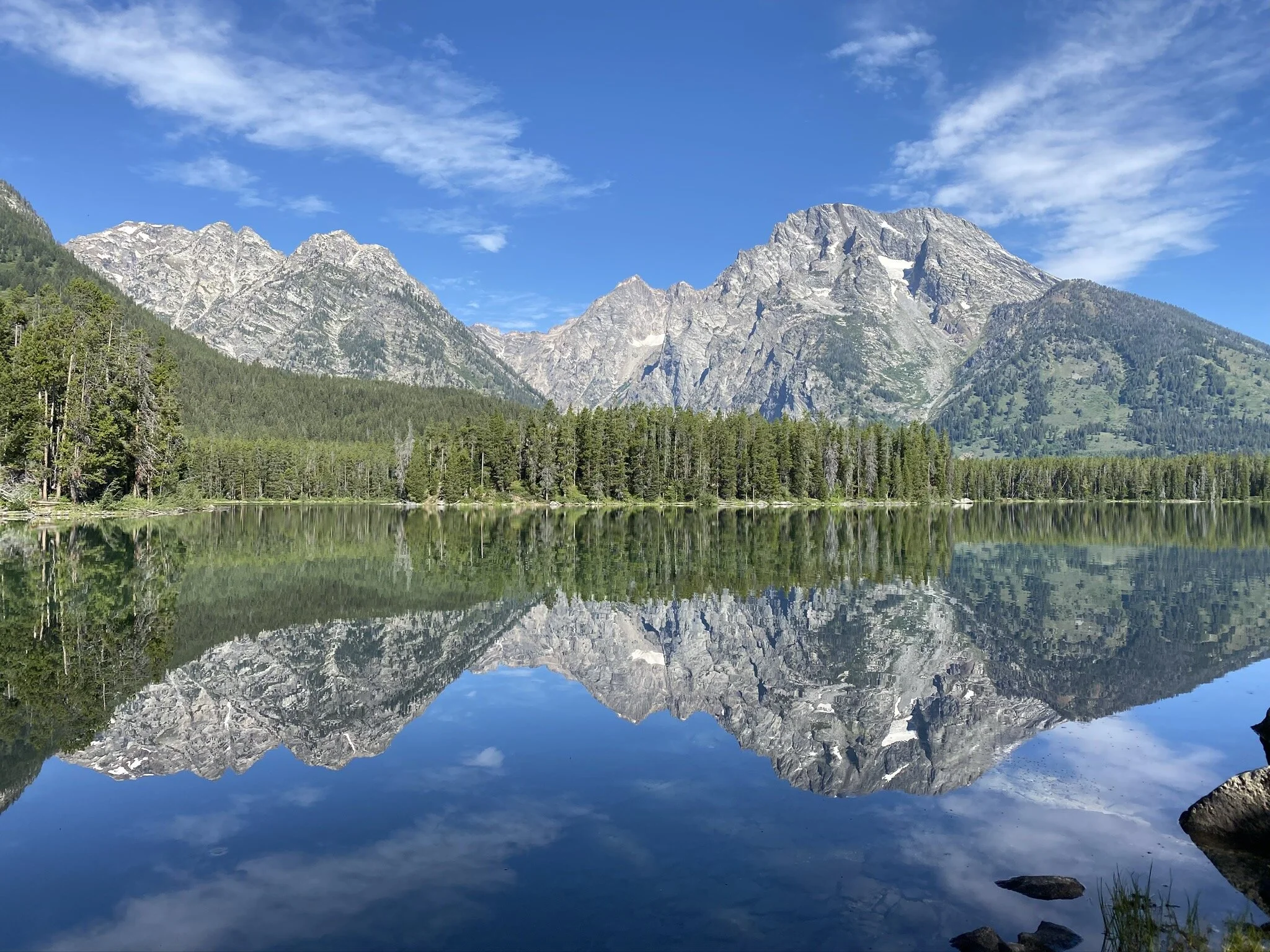 The best time to see the Tetons is in the morning while the lakes are still
