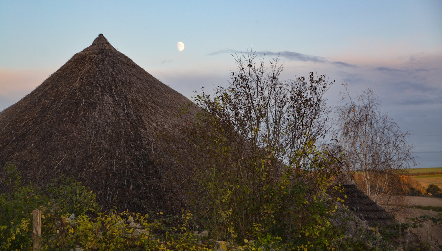 Butser Ancient Farm Iron Age Roundhouse with moon