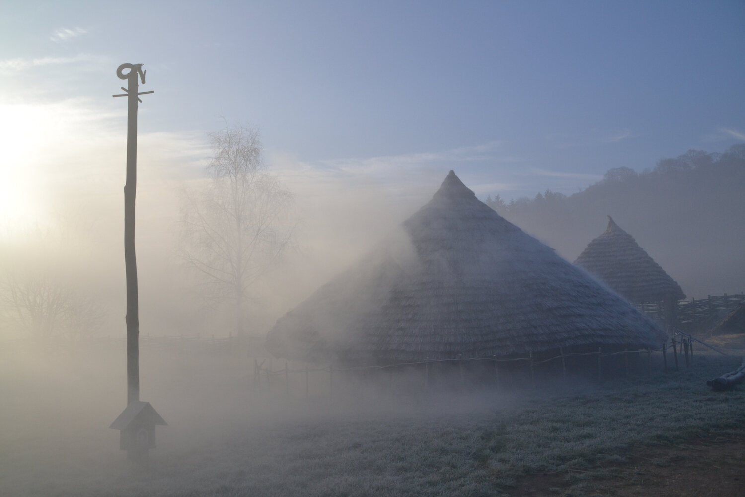 Butser Ancient Farm Iron Age Roundhouse in mist