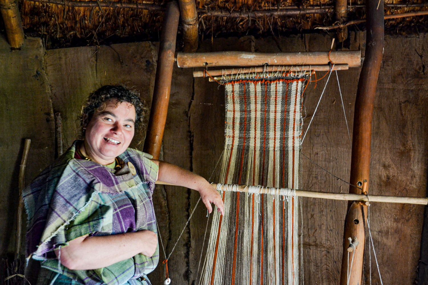 Butser Ancient Farm Iron Age reenactor weaving