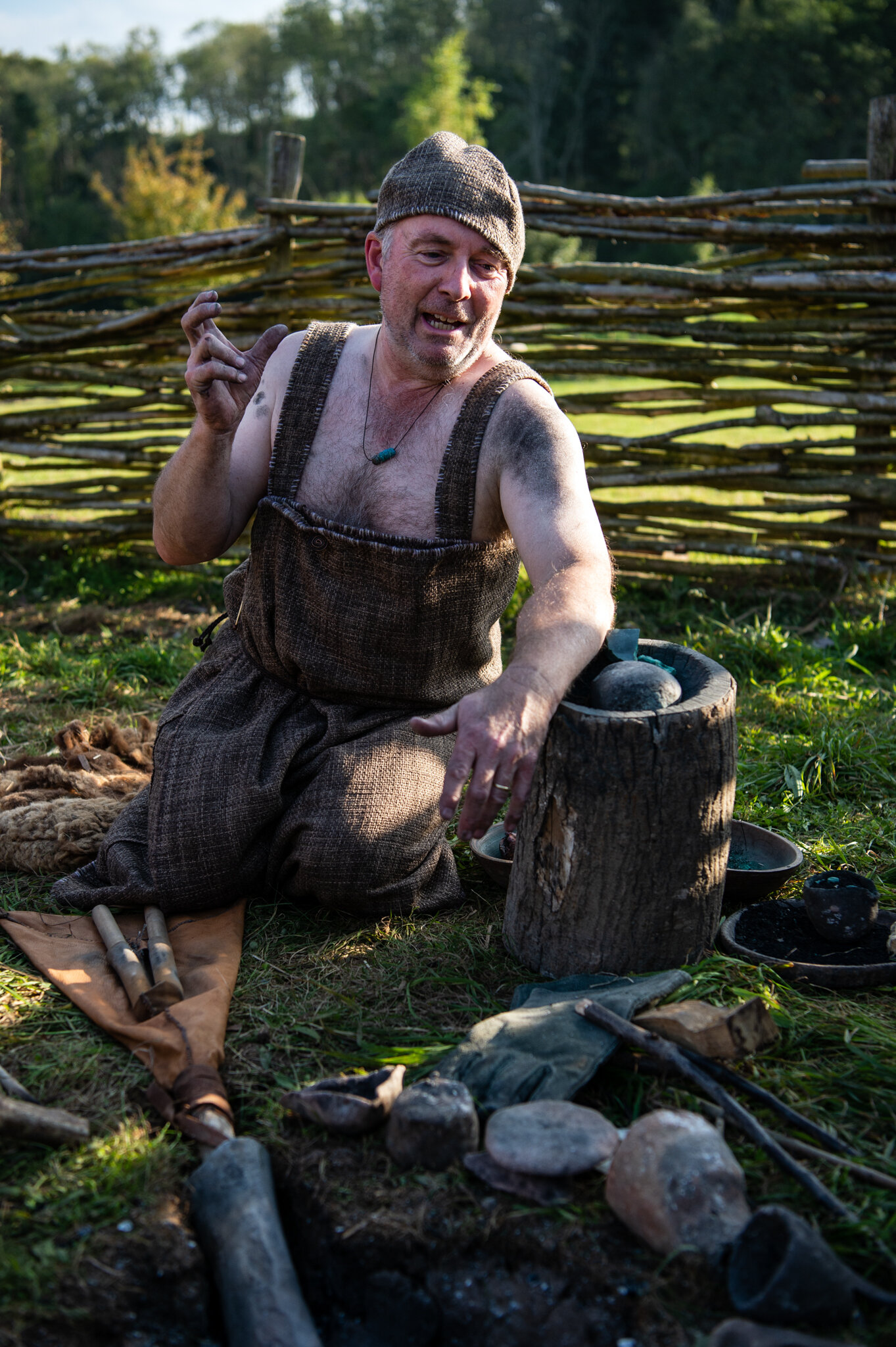 A reenactor demonstrates Bronze smelting