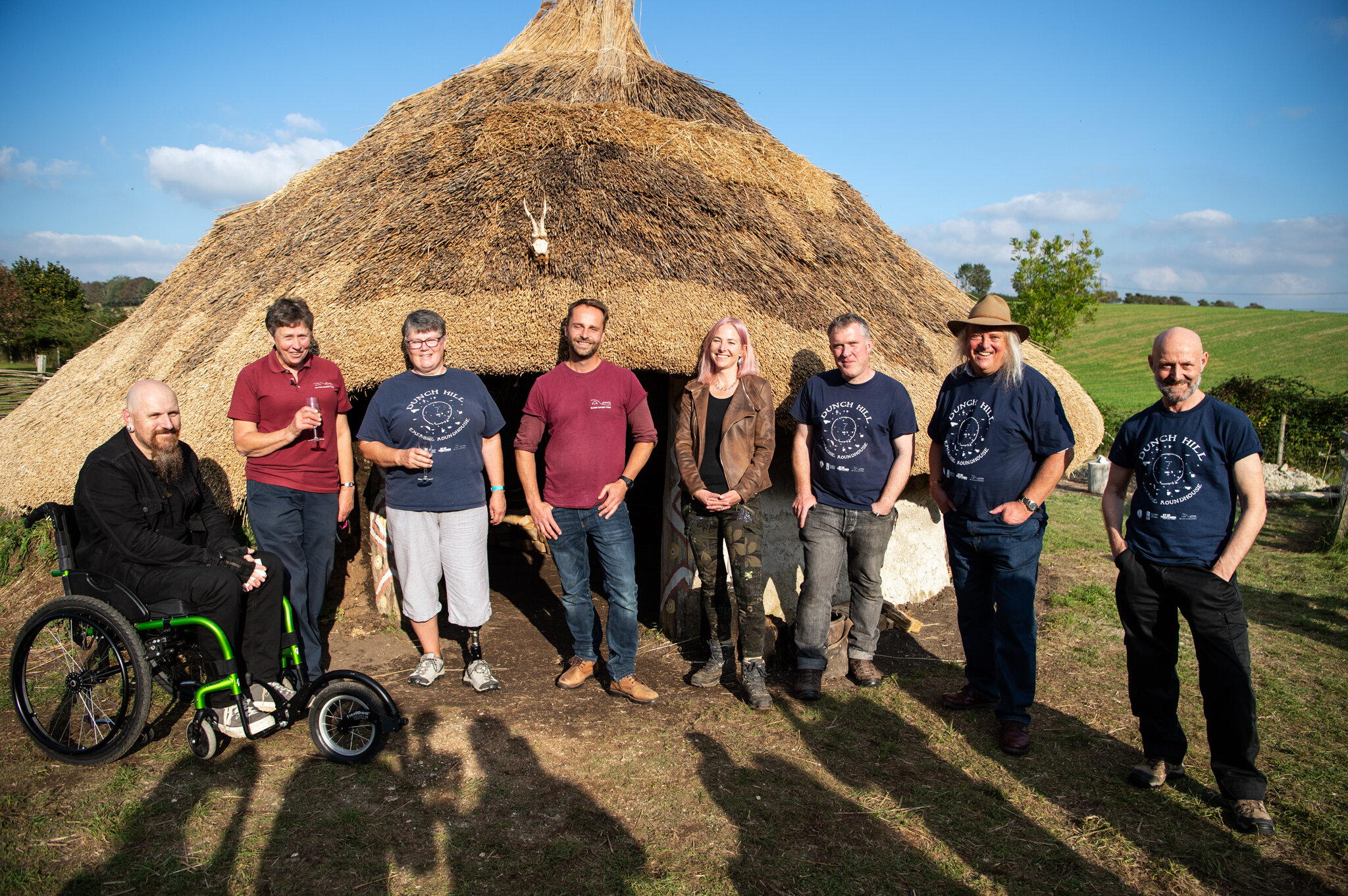 Professor Alice Roberts poses with Phil Harding, Richard Osgood, Stuart Prior, Elaine Corner from Step Together and the Butser Directors