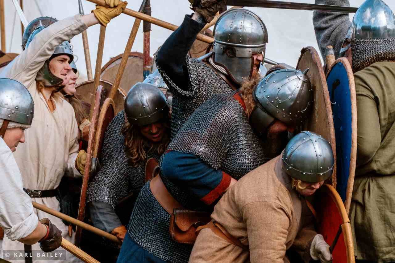 Viking warriors fight in a reenactor battle at Equinox Viking Boat Burn.