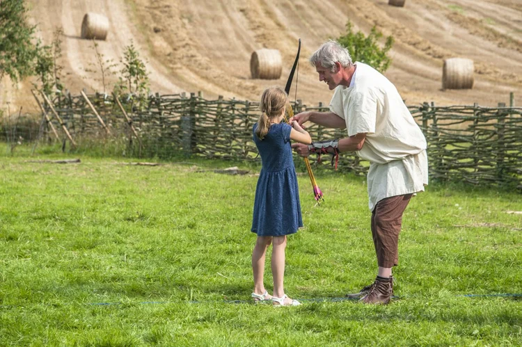 Kid Learning Archery (Eleanor Sopwith).jpg