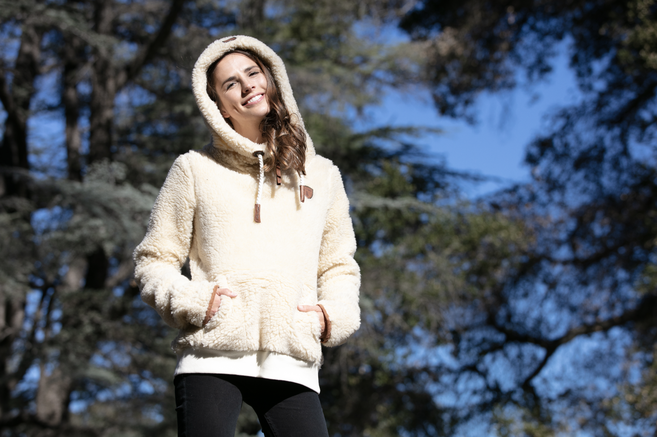 Fluffy sherpa fleece makes for the COZIEST hoodie - with half-zip neck detail.