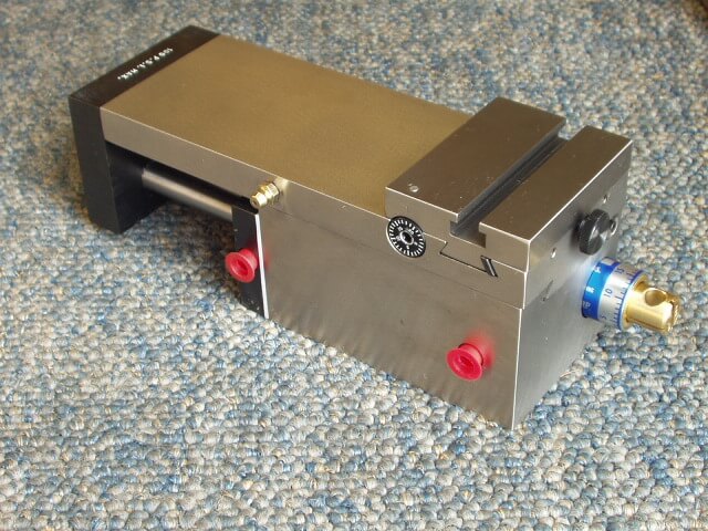 PL Slide- Air Powered with Rapid Travel, Controlled Hydraulic Feed and Adjustable Stop.