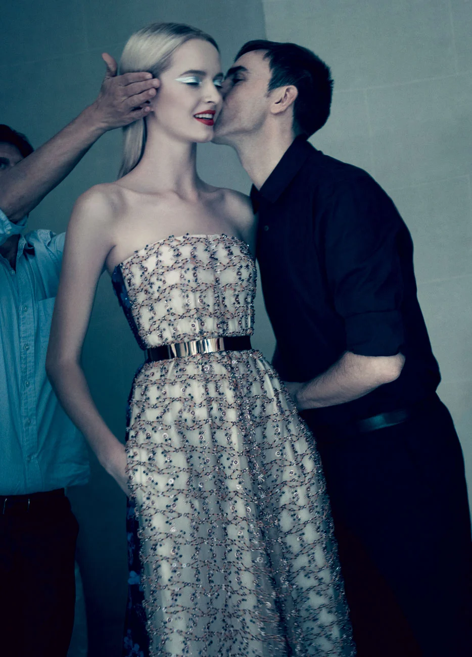 Raf Simons kisses a model good luck before his first fashion show for Dior