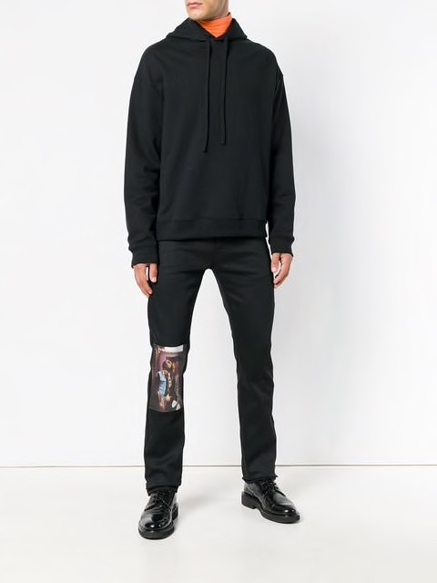 Pants from Raf Simons’ AW18 collection with picture of Natja Brunckhorst and Thomas Haustein as Christiane F. And Detlev R. in the Biopic of Christiane F.’s life picture taken from farfetch.com