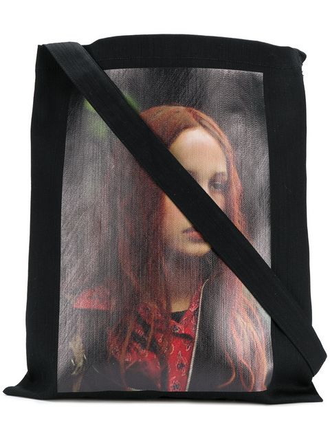 Tote from Raf Simons’s AW18 collection with picture of Natja Brunckhorst as Christiane F. in the Biopic of Christiane F.’s life picture taken from farfetch.com