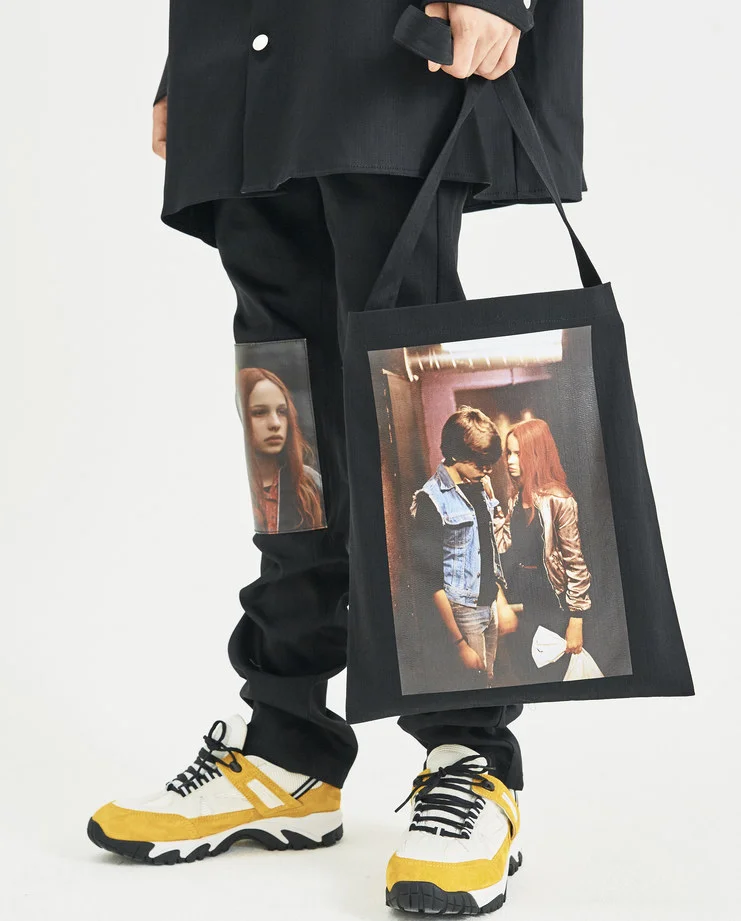 Tote from Raf Simons’s AW18 collection with picture of Natja Brunckhorst and Thomas Haustein as Christiane F. And Detlev R. in the Biopic of Christiane F.’s life picture taken from machine-a.com