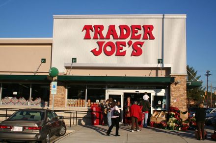 "Trader Joe's" written in red above entrance to store.