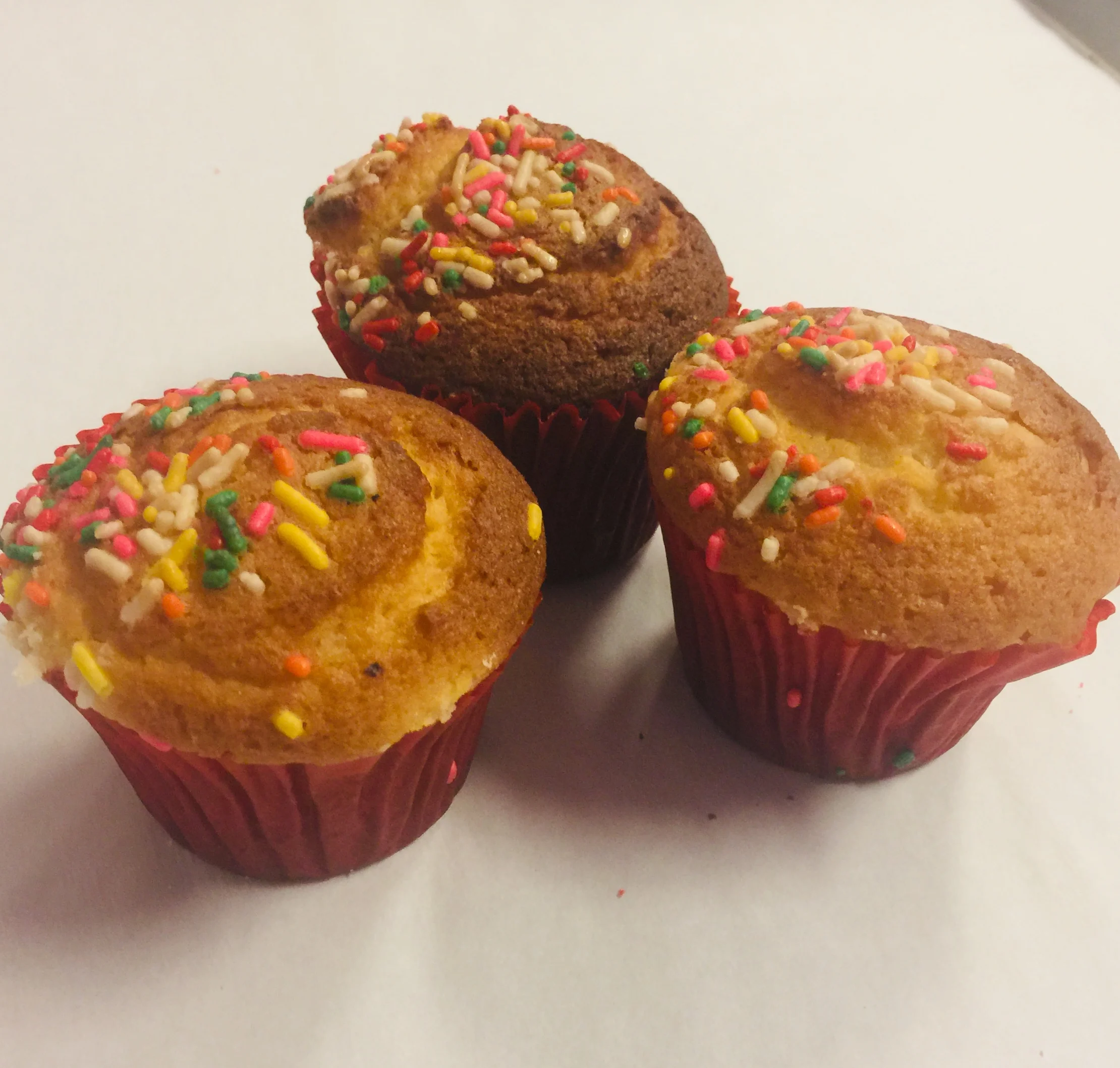 Mantecadas con grajea (vanilla cupcake with sprinkles)