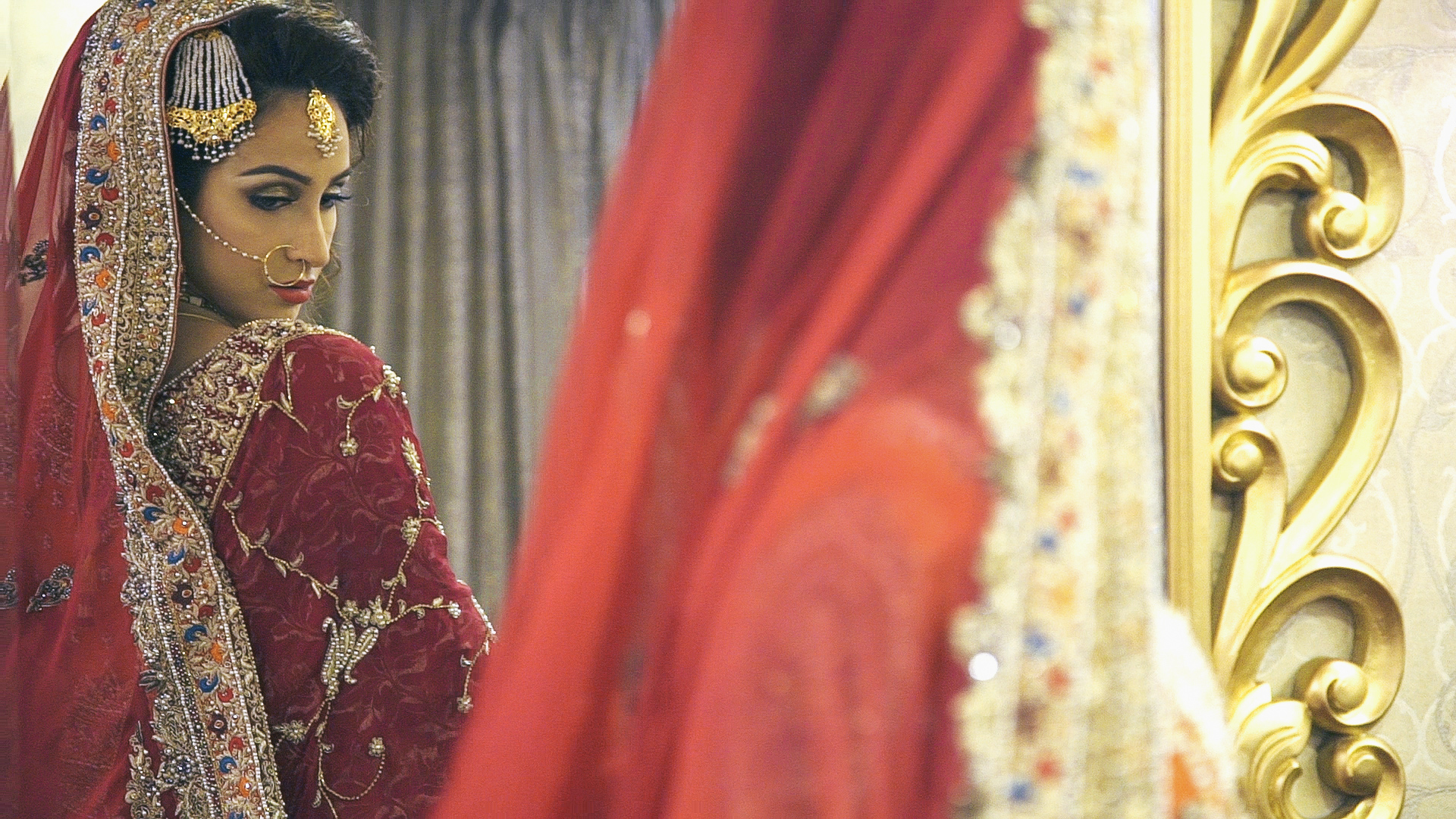  Sadaf Saeed does a final check of her wedding attire before leaving for the wedding venue on the day of her  baraat . 