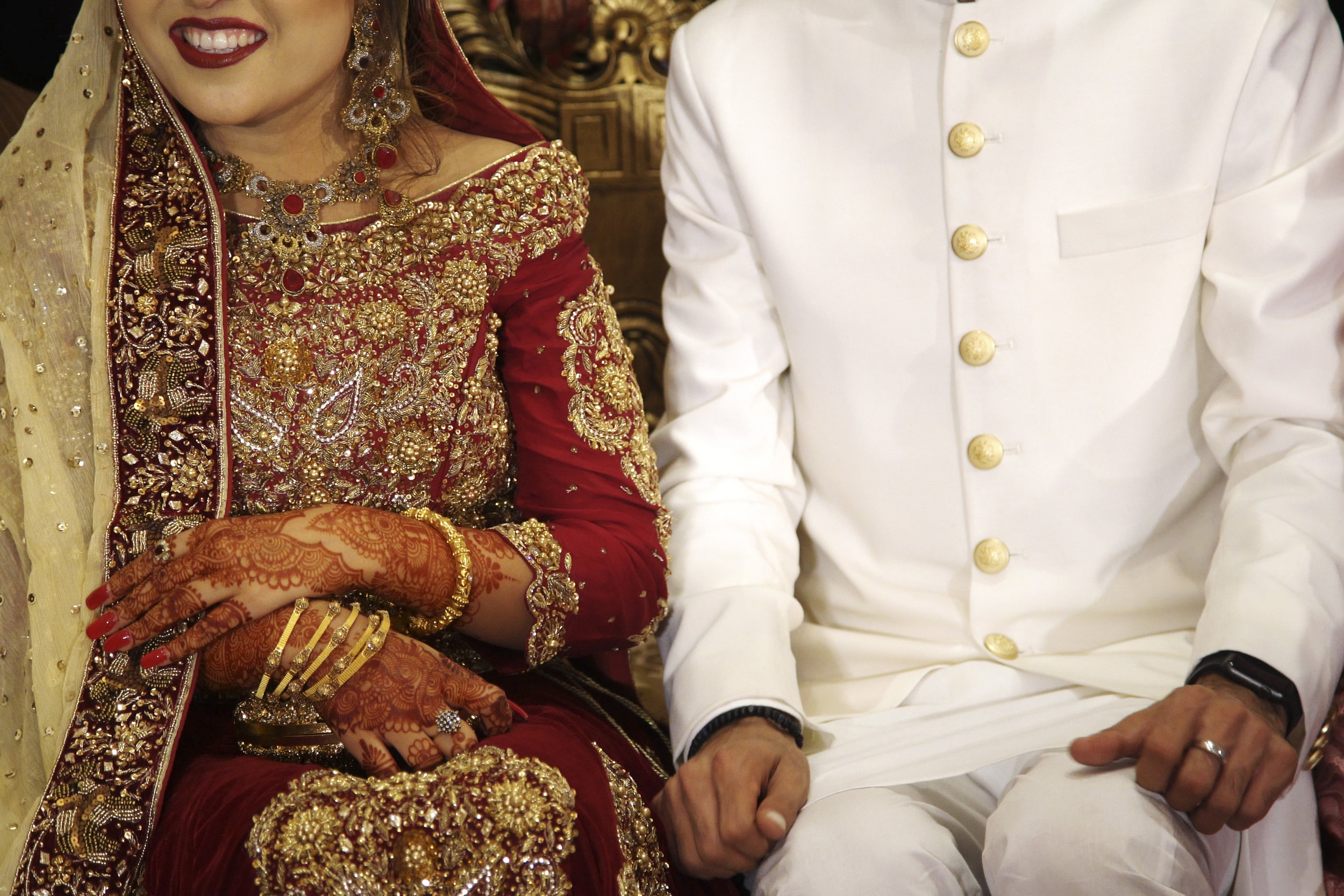  Ayesha and Ayaz Sadal sit together at the wedding venue on the day of their  baraat . 