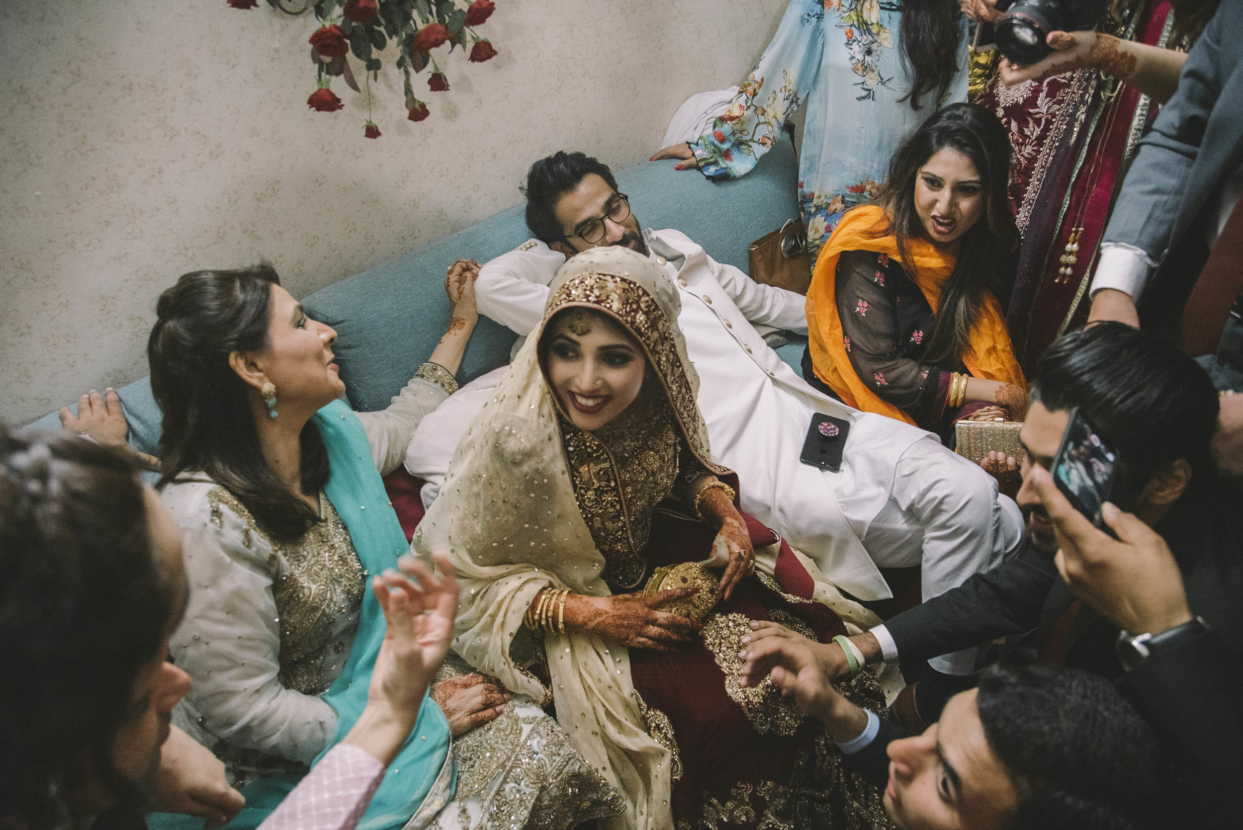  Ayesha is welcomed into Ayaz's home on the night of their  baraat , and a new tradition takes place. During  God’a Baithai , family members and friends surround the couple and ask the bride for money as a present. If the bride doesn't give them mone