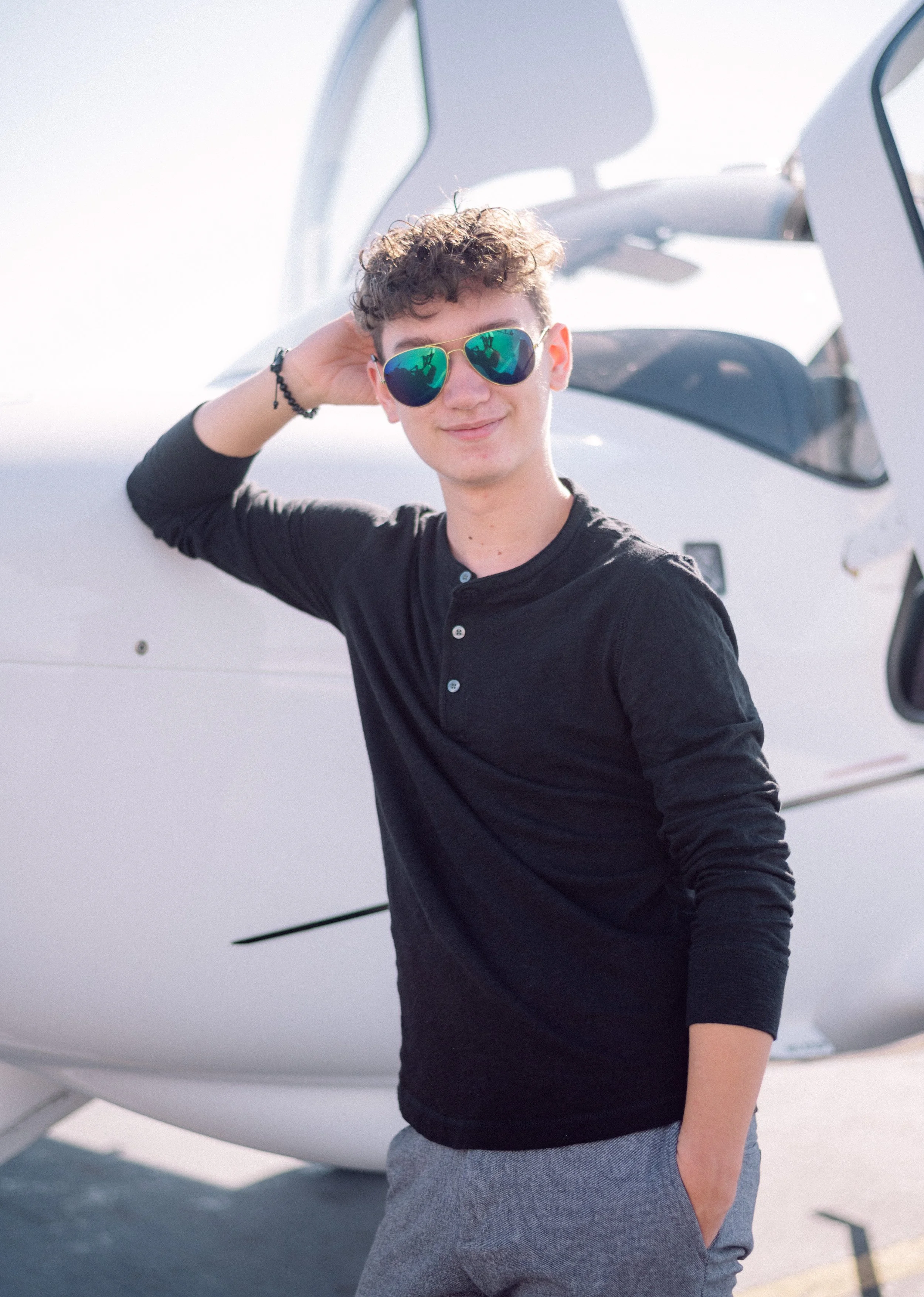senior-photo-senior-with-plane.jpg