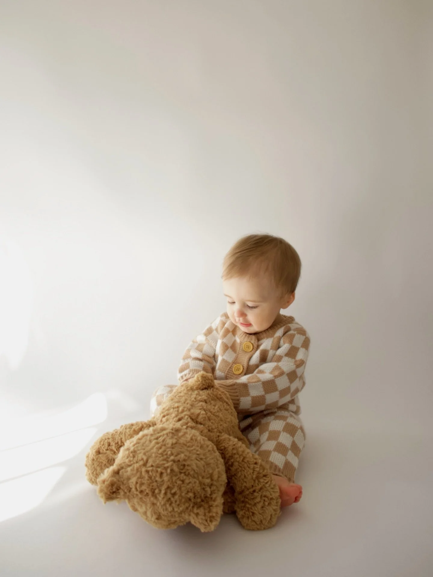 🧸 &mdash; portraiture against a white backdrop, capturing the little stages you want to hold on to 🤍