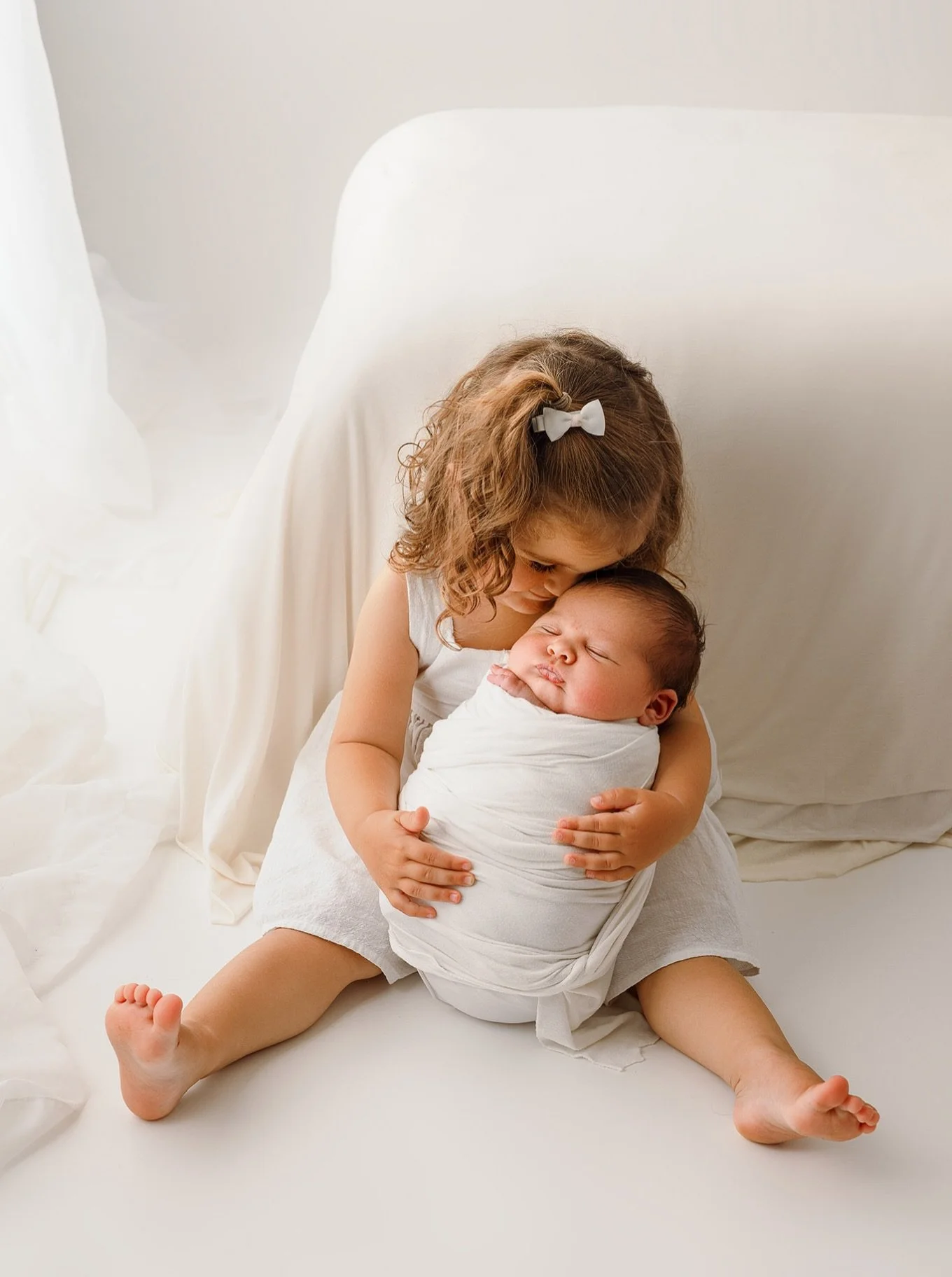 This sweet little snuggle. There&rsquo;s nothing like watching your first baby love on their new sibling. 

They have no idea yet that this little person will be there the rest of their life. 

Definitely one of my favorites from this session. 

Now 