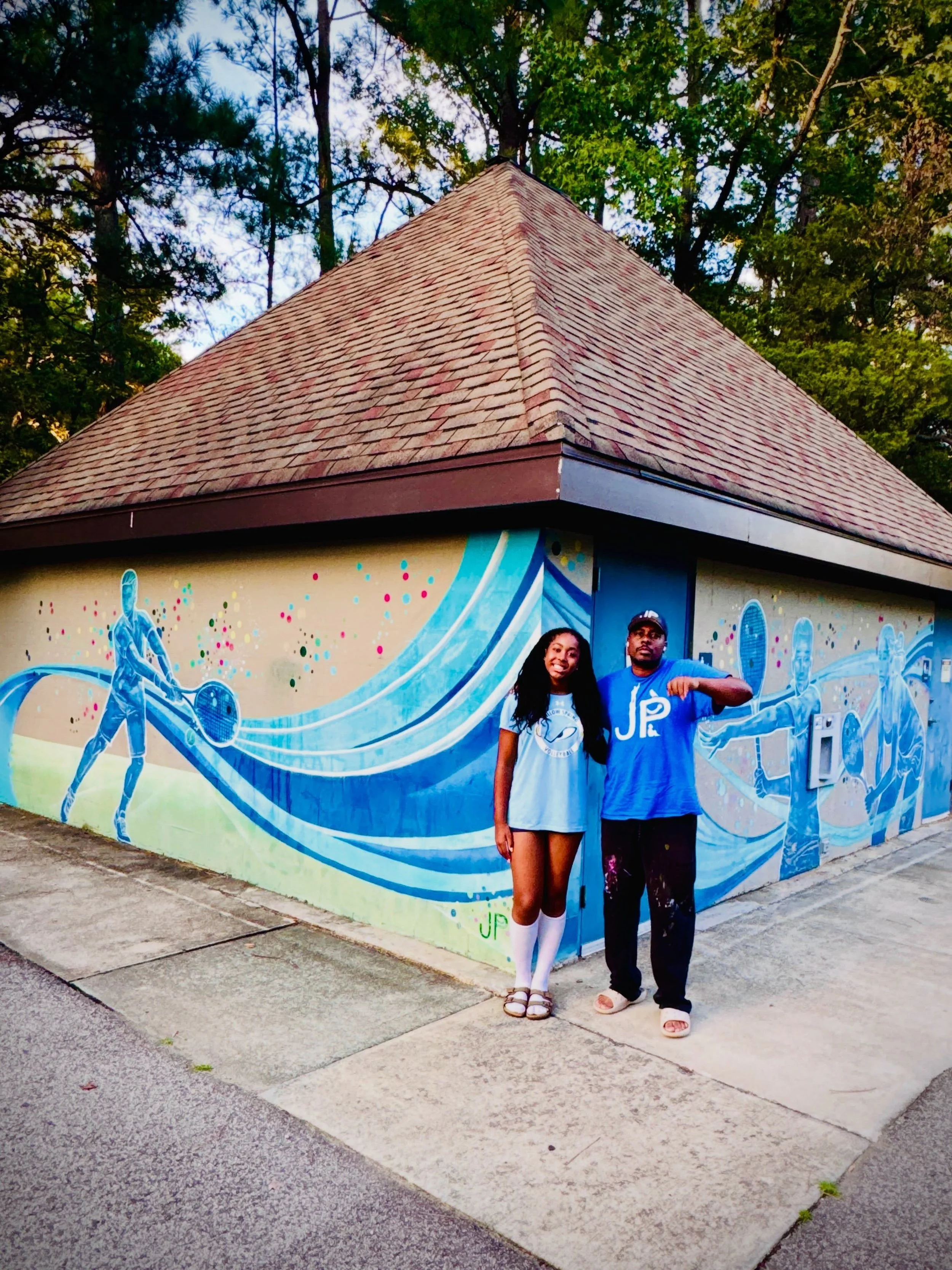 This is&hellip;💪🏾🇺🇸 Art History In The Making&trade;️. 🩵💙BABĒ had a volleyball 🏐 game today in Durham and I got a chance to see one of my first murals at Garrett Road Park in #Durham 8 yrs ago. Thank you to @durham_arts for supporting my work 