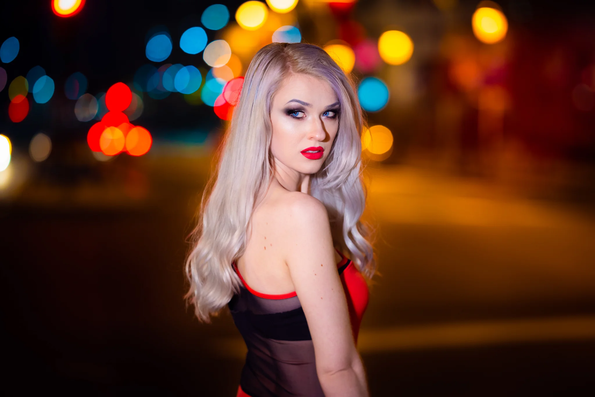 Annie Pollard, with Center City’s lights behind her.