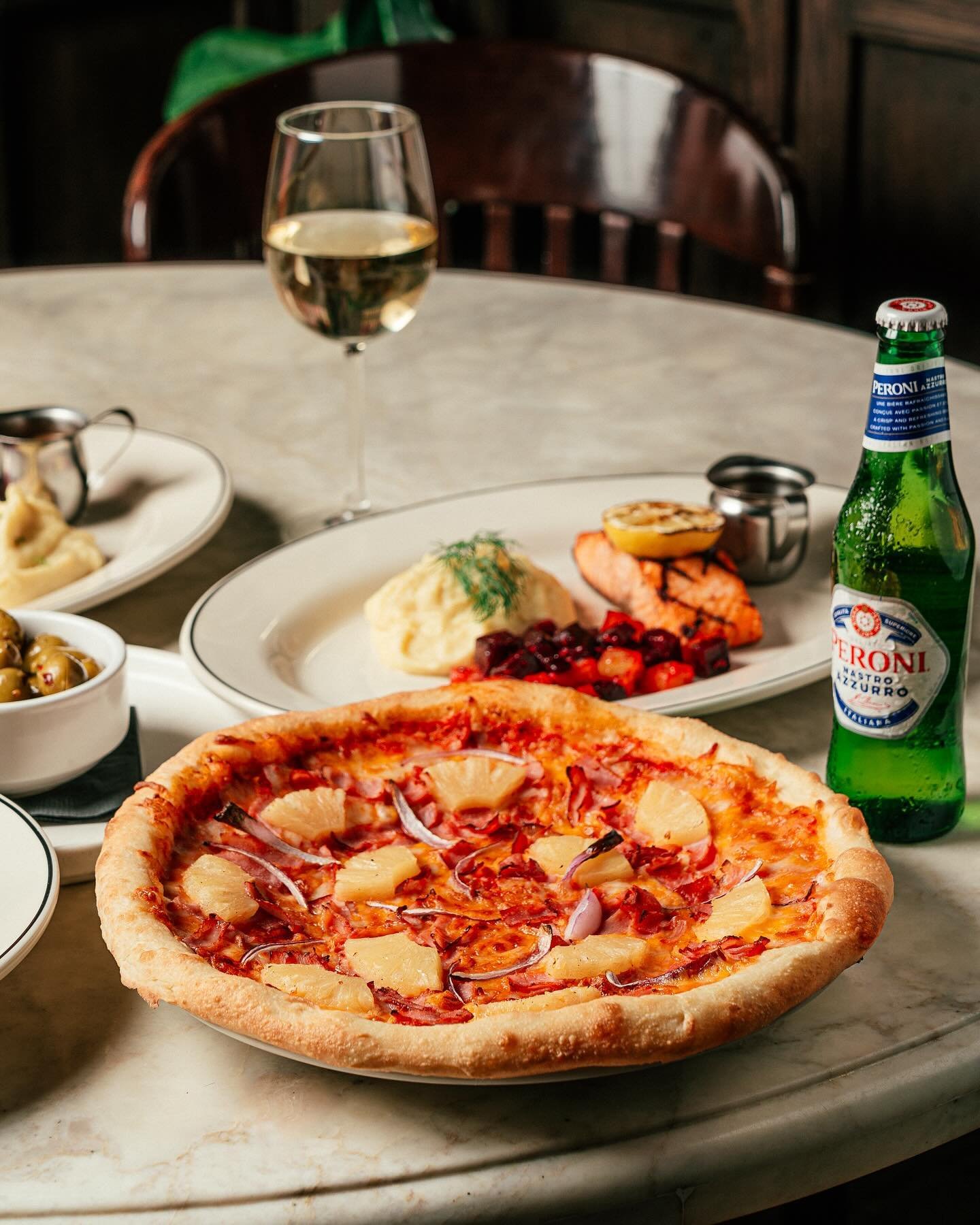 Dive into delicious with our mouthwatering Spring Summer Menu arrivals! 🤤 

Our Hawaiian Pizza is made from house-made dough, ham, pineapple and red-onions! 🍕 🍍 

Seafood lovers will be obsessed with our Maple Cajun Salmon, served with our signatu