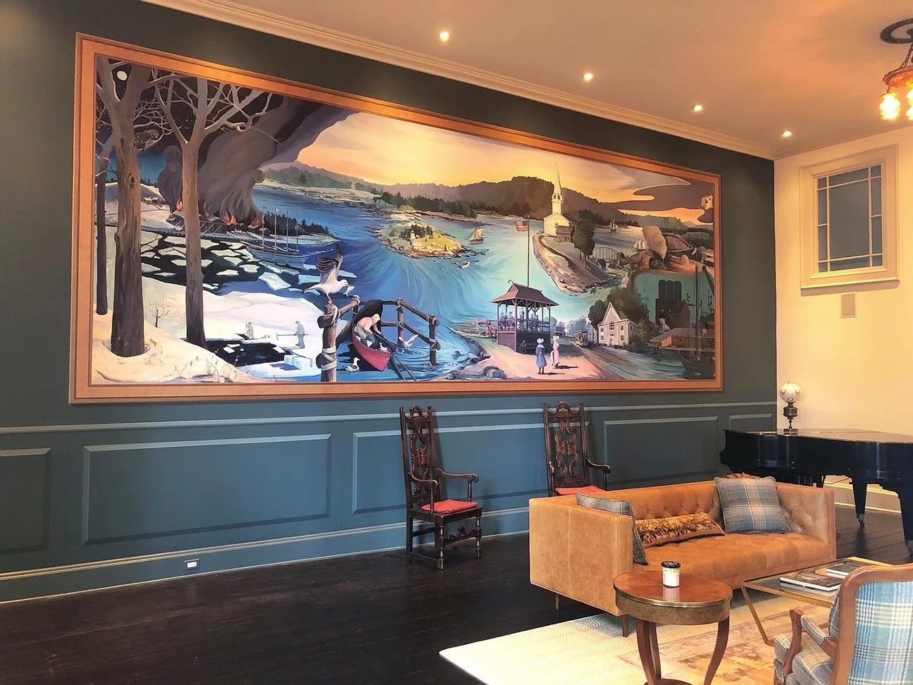 The tromp l oil frame and paneling below lent a great sense of the illusion that this is a large painting hanging on the wall. I was thrilled to put my decorative arts skills into work to make this mural something special.