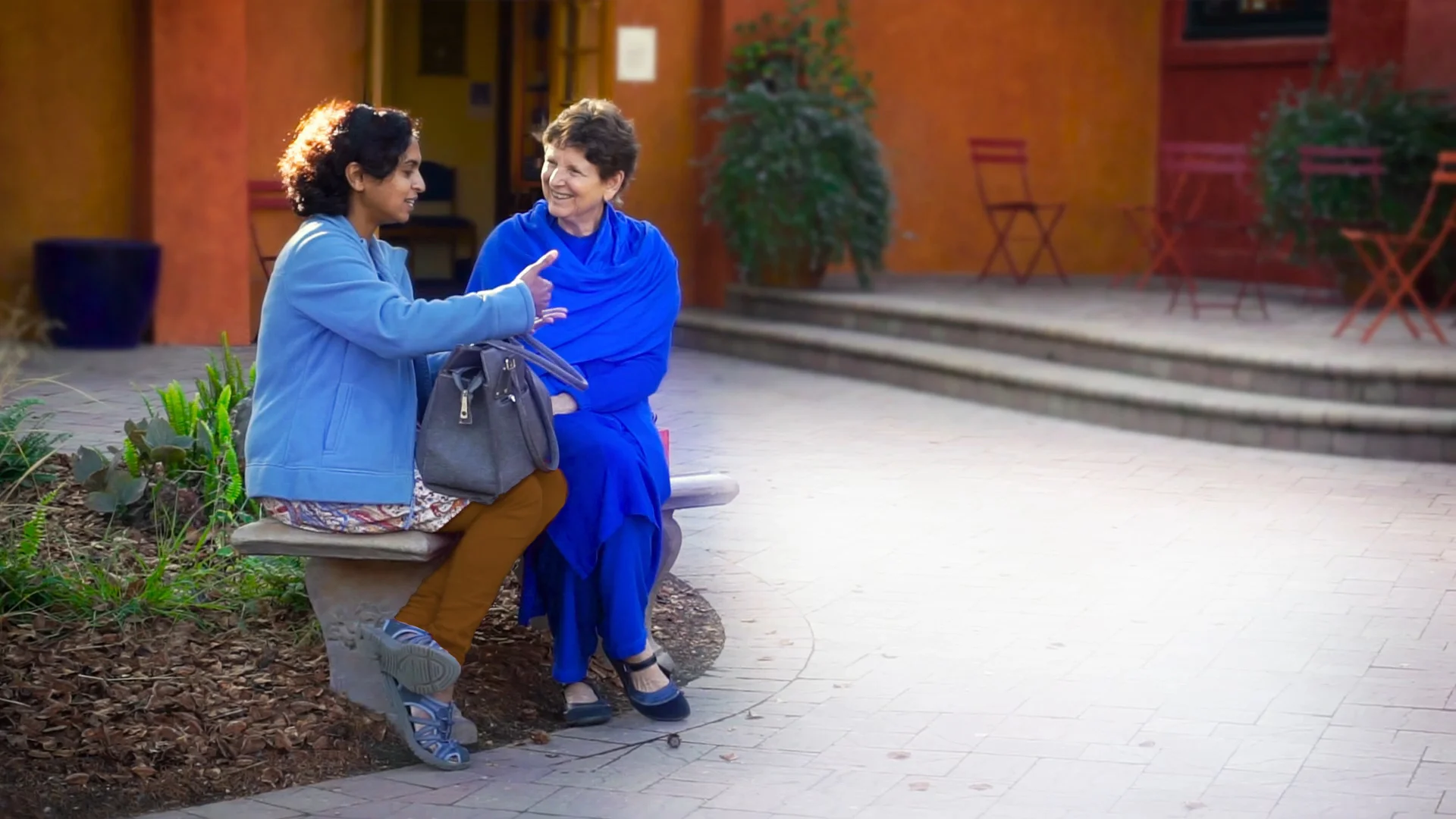 Asha talking in piazza.jpg