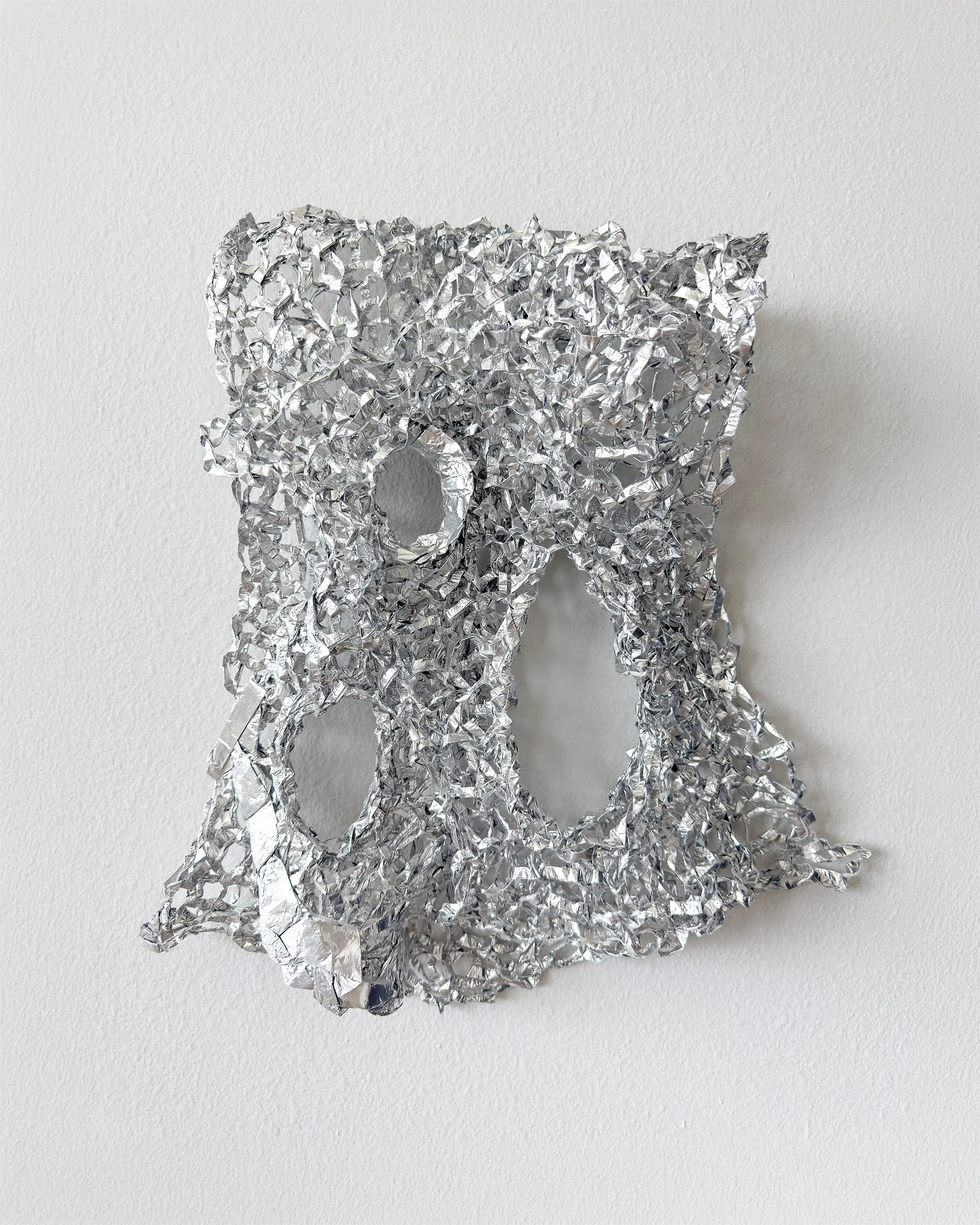 58 Joyous Exchange
2026
Aluminum, polyester tape
19 x 17 x 5 in.