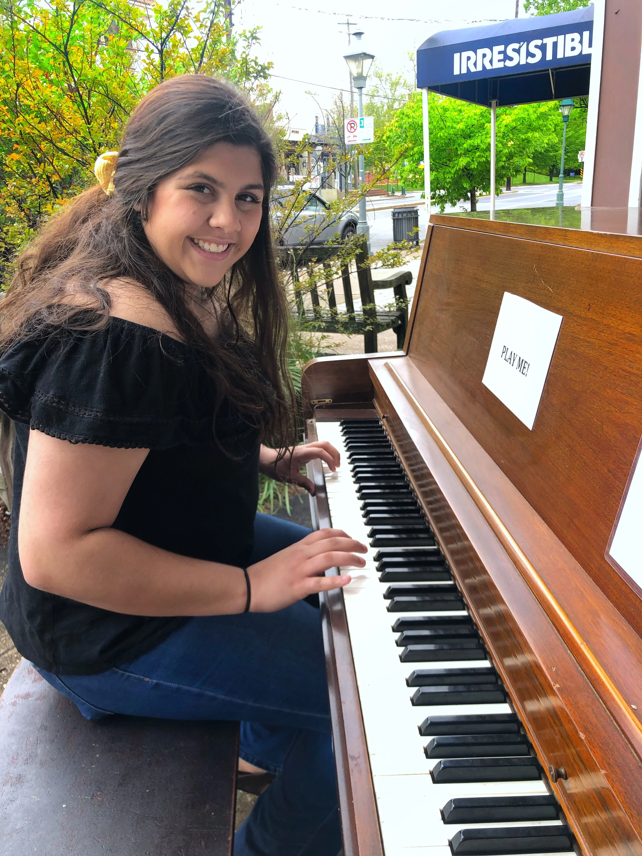 Korina Plays Grove Piano.JPG