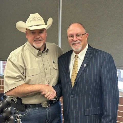Sheriff Brad Norman with Scott Wert of Linebarger Attorneys at Law