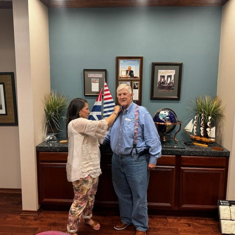 Board President Cammy Jackson awarding Doug Hunt with his Pinwheel Pin
