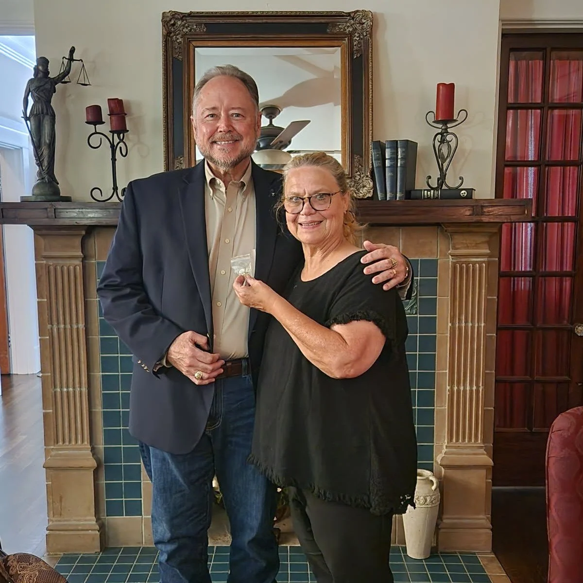 Board Member Carrie Wilson at the pinning of Greg Wilhelm of Canty Hanger