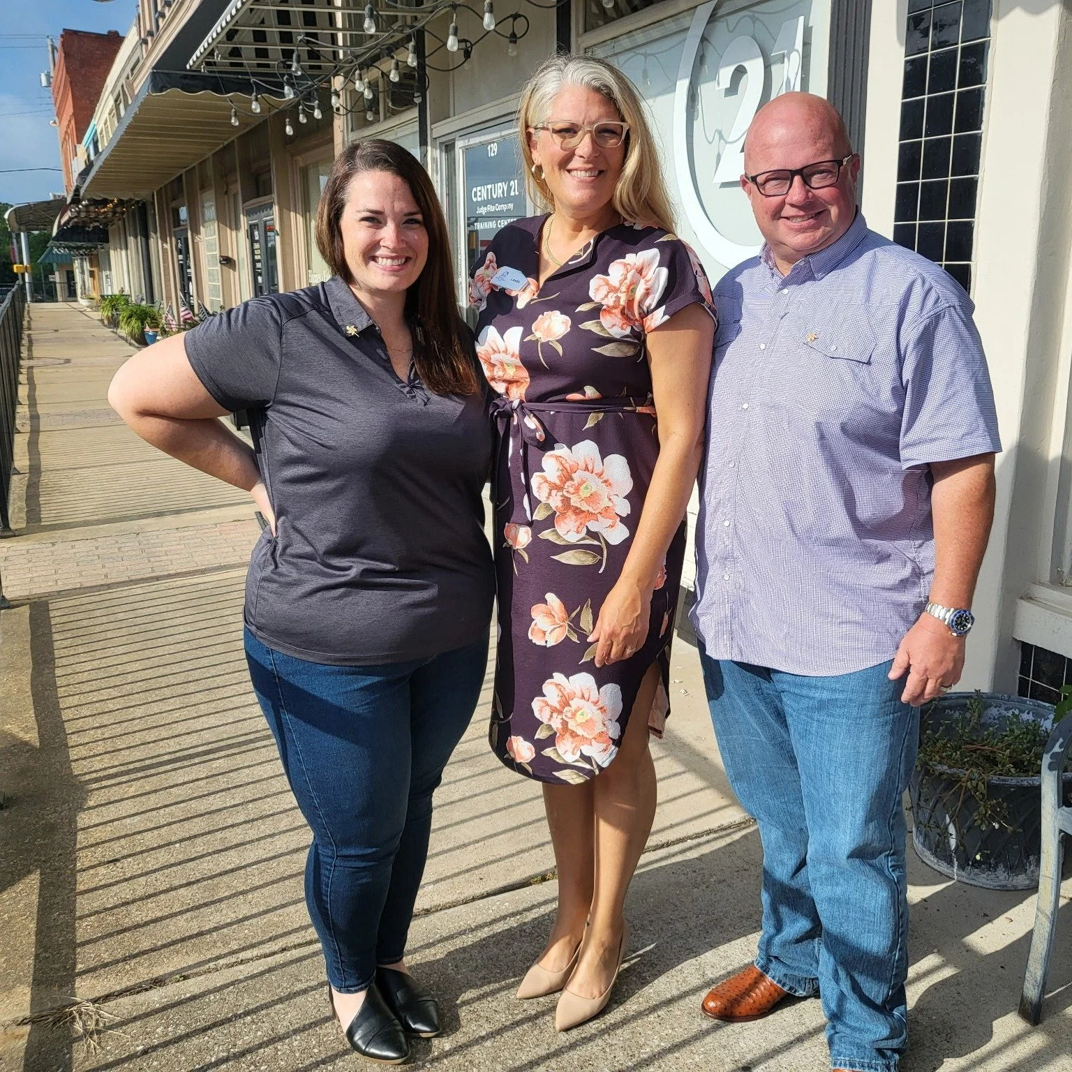 Heaven Woolverton and John Knight of the Knight Family Foundation with Leslie Deen receiving their Pinwheel awards on behalf of the Foundation.