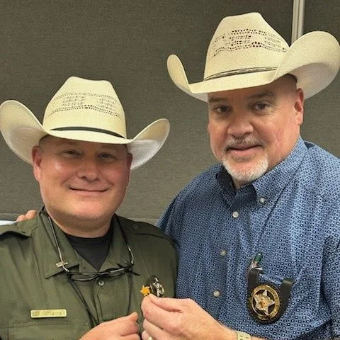 Mike McKenna of Ellis County Sheriff's Association with Sheriff Brad Normal