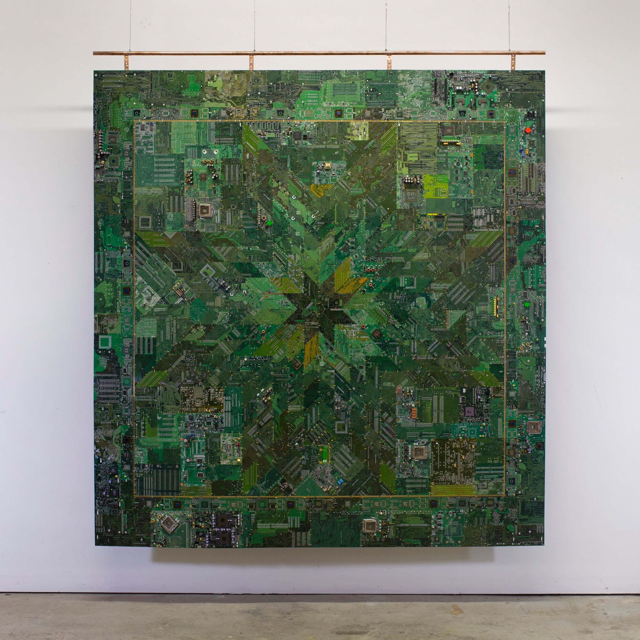   Green Star Quilt , 2019, Circuit boards, brass wire, and copper tube, 193 x 179 cm. COURTESY OF KT KANAZAWICH  