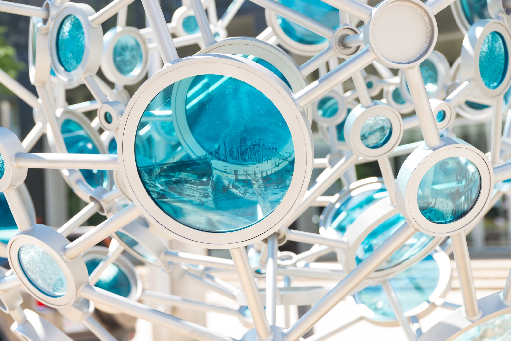   Tyler Rock and Julia Reimer ,  Transect (detail) , 2017. Stainless steel, Laminated Glass, Cast Glass, window portal 30 cm diameter. Photo: Charles Boulet. 