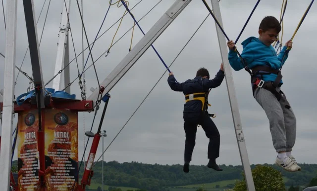 children bouncing on trapeze.jpeg