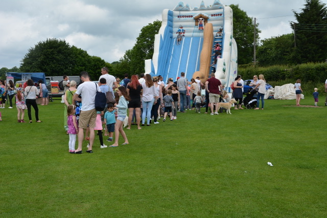 LIning up for the bouncy slide.jpeg