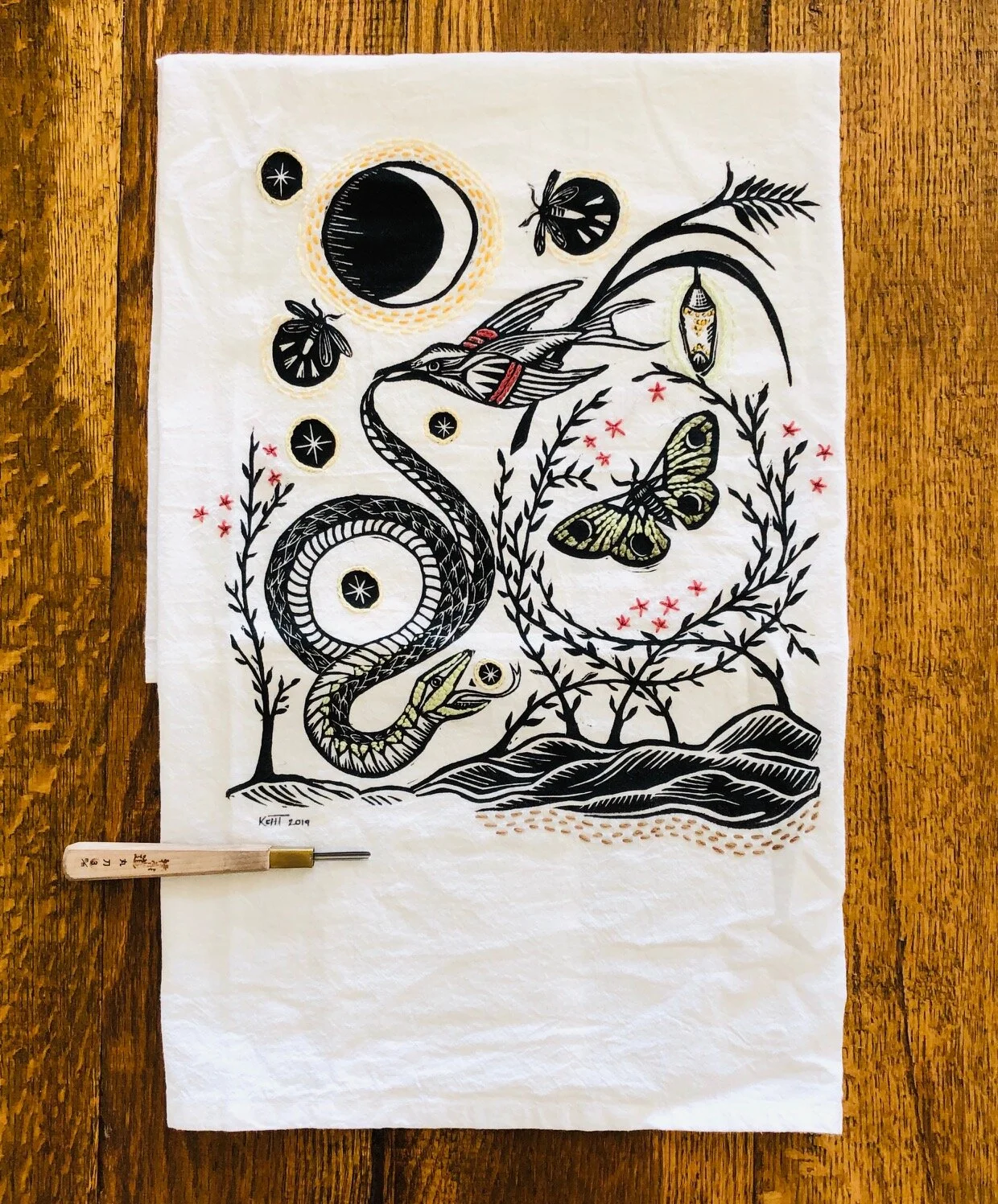 Wild Magic hand embroidered tea towel