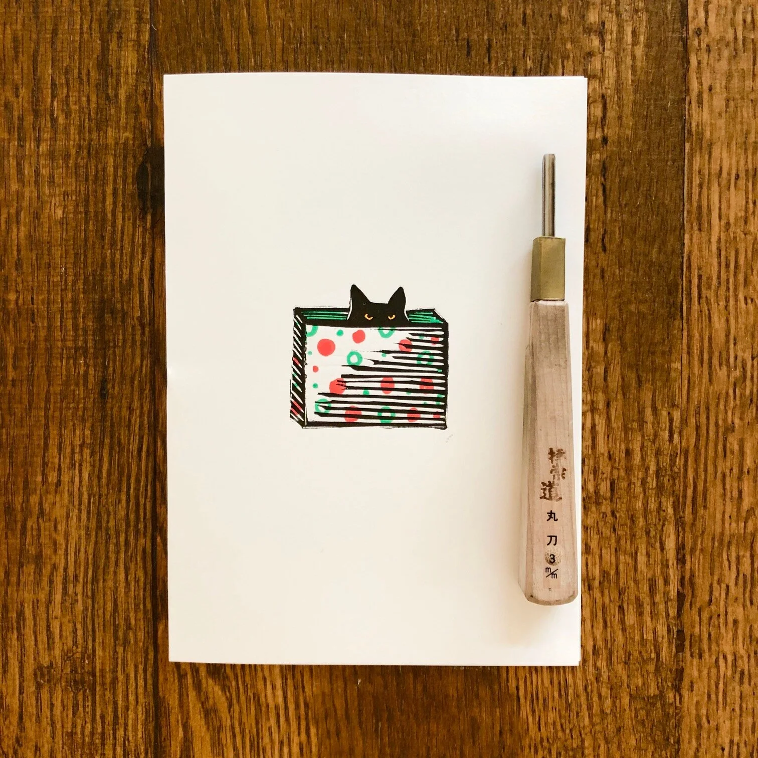 Cat in a holiday box card