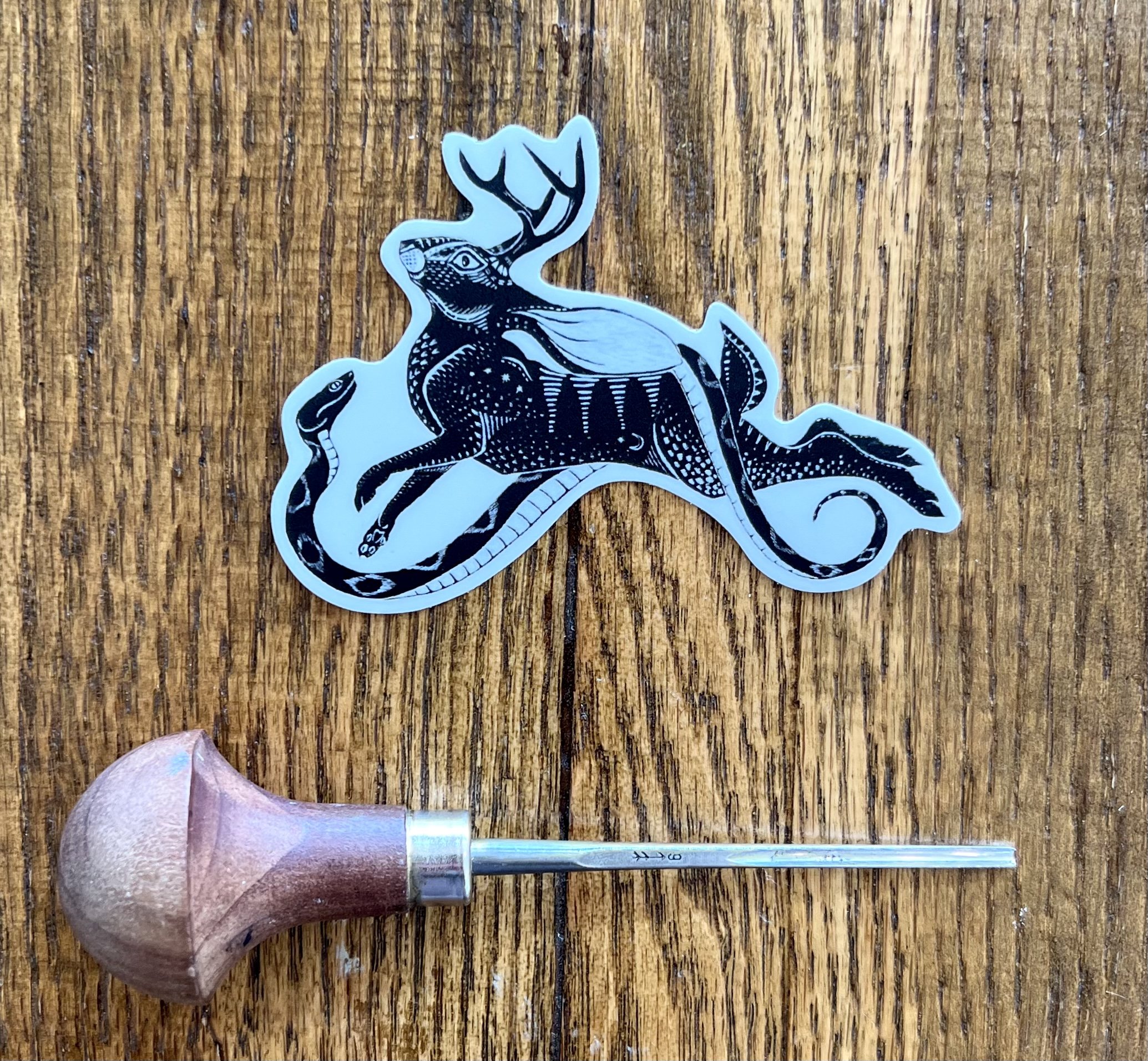 Jackalope and serpent clear sticker